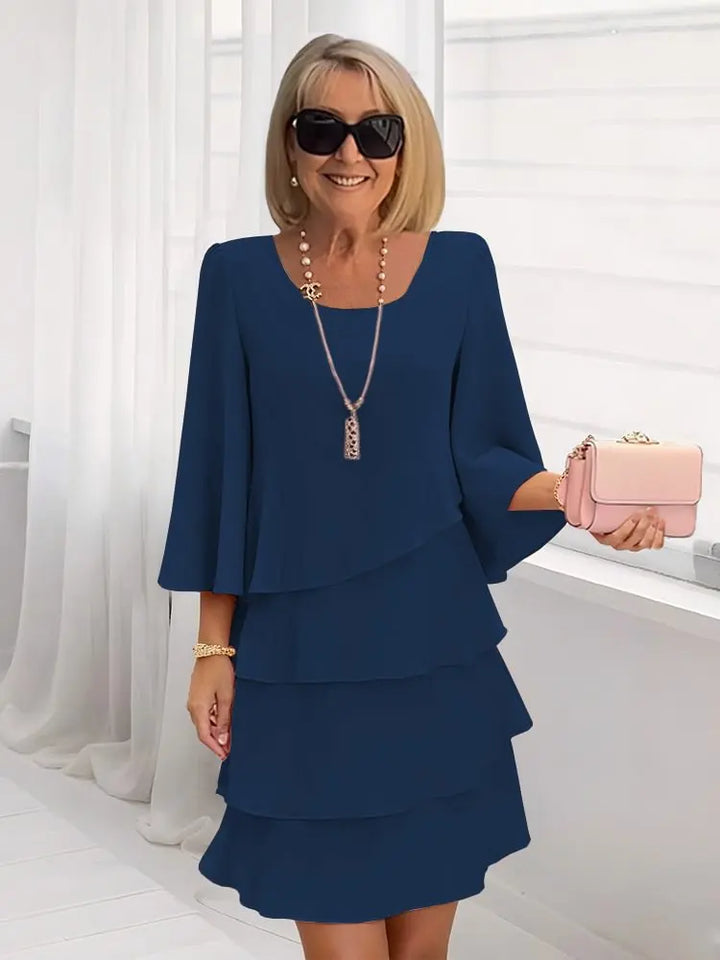 Comfortable women's A-line ruffle dress with short sleeves, ideal for casual spring or summer outings.