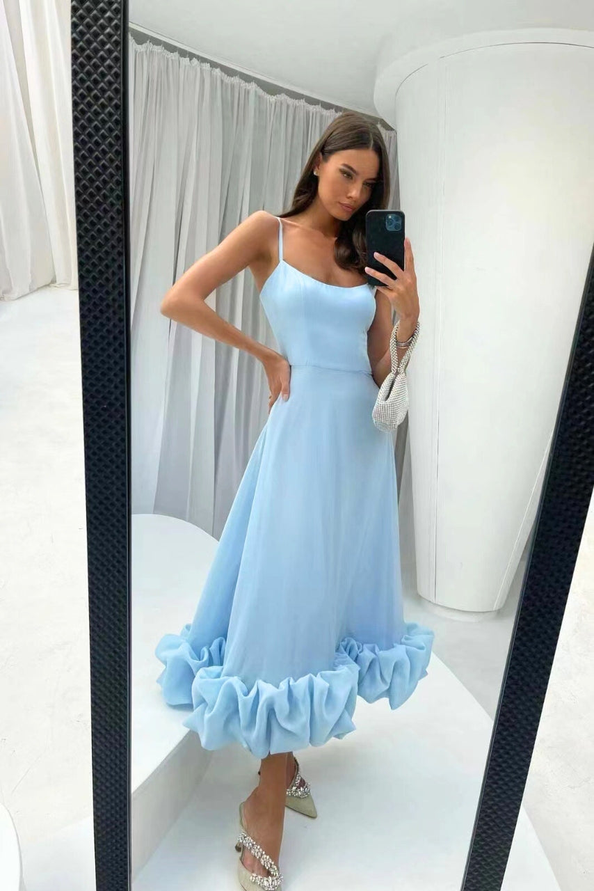 Stylish women's party dress: elegant ruffle hem midi. Ideal strappy evening wear for special occasions.