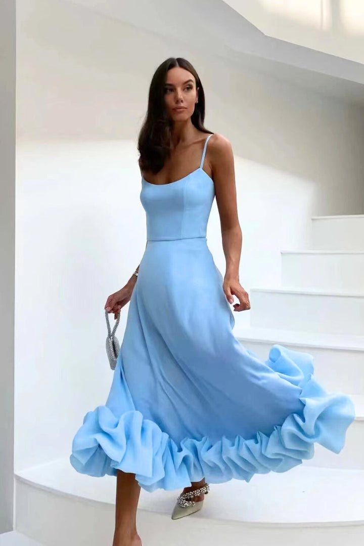 Women's elegant midi dress with ruffle hem, suitable for formal parties, weddings, and evening events.