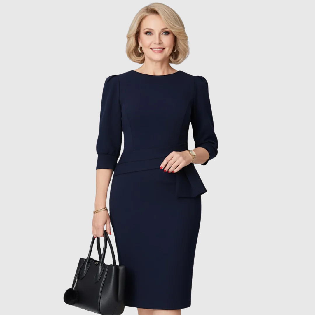Sophisticated women's midi dress featuring stylish ruffles, three-quarter sleeves, and a flattering peplum design.