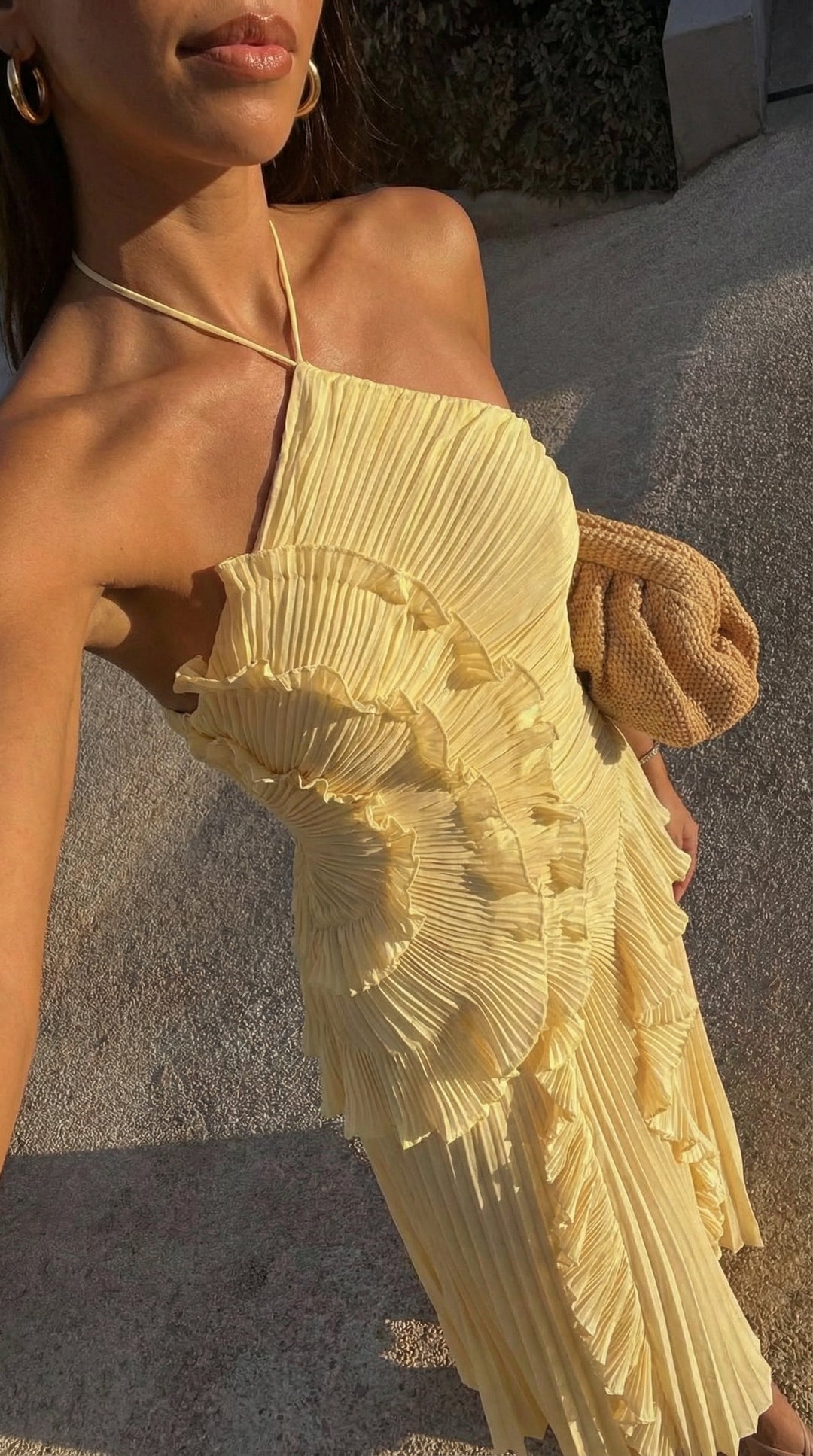 Women's formal occasion maxi dress, featuring delicate ruffles and spaghetti straps.