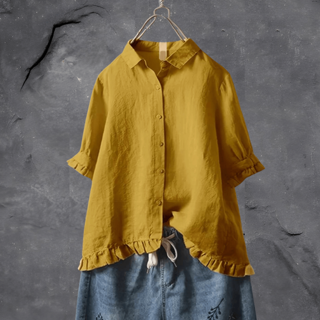 Elegant women's ruffled hem short sleeve collared blouse with button-front, ideal for casual wear or professional settings.