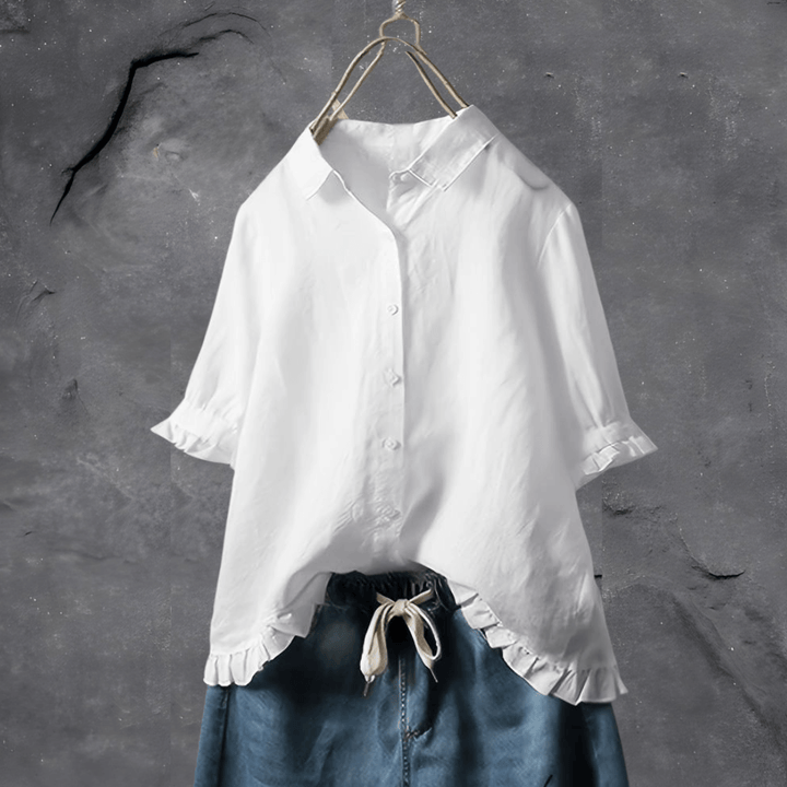 Dark blue plus size women's button-front blouse with an elegant ruffled hem and short sleeves. Perfect for workwear.