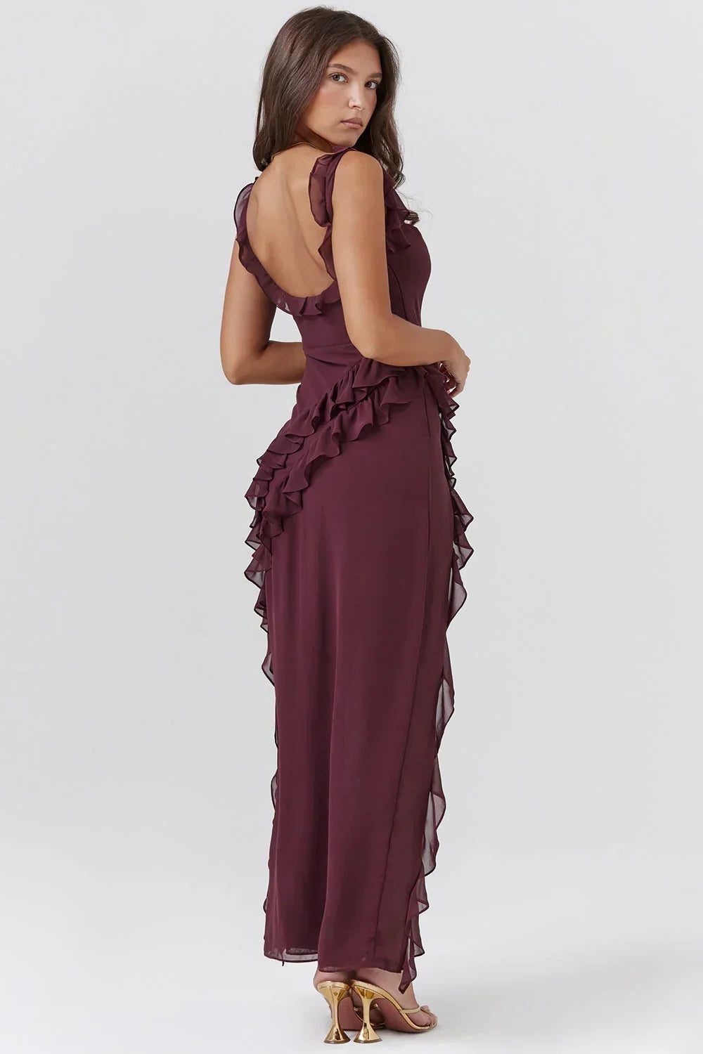 Chic women's elegant wedding guest maxi dress with beautiful ruffles for formal evening wear.