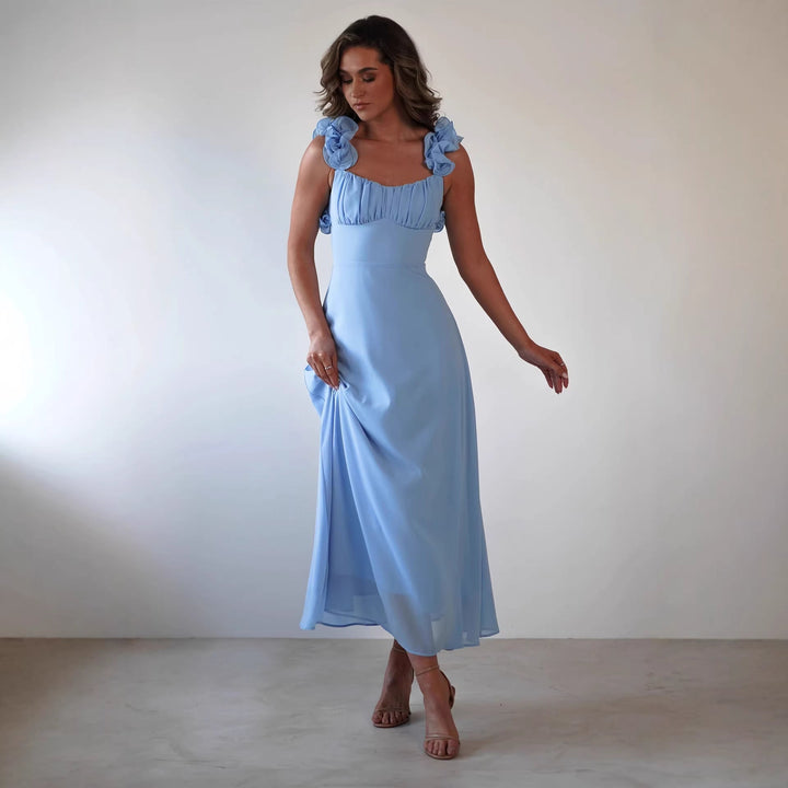 Elegant women's ruffled shoulder maxi dress for wedding guests. Perfect A-line formal party attire.