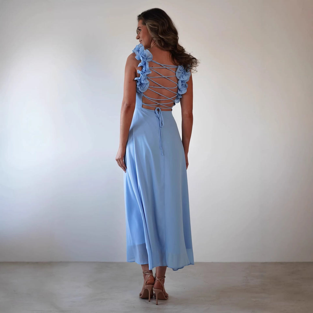 Sleeveless square neck maxi dress with elegant ruffled shoulders. Women's A-line formal wear, ideal for weddings.