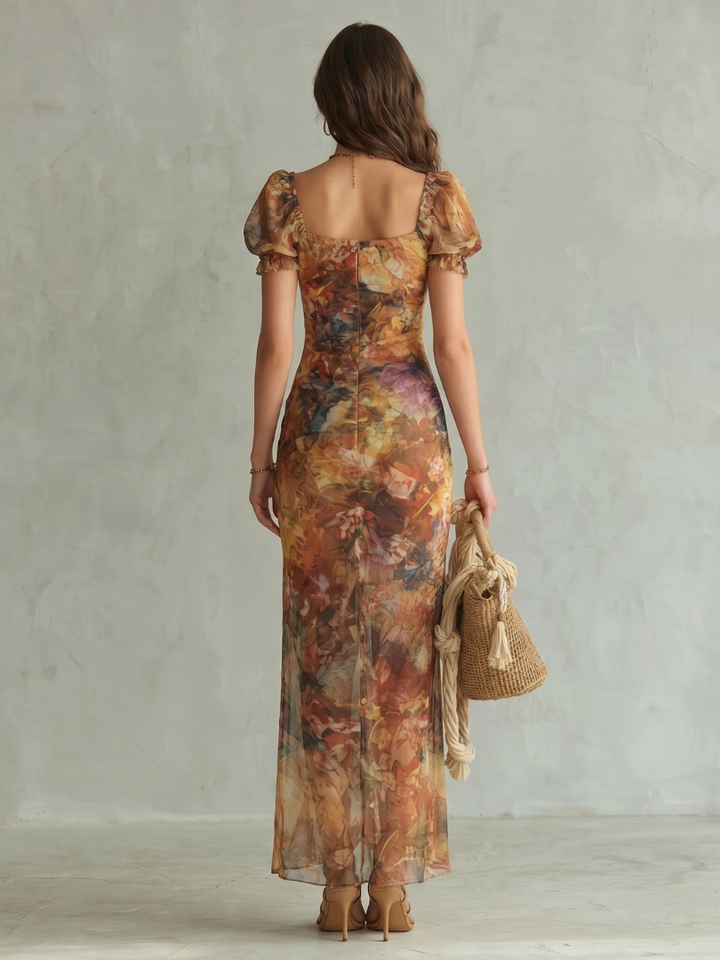 Women's elegant party dress: ruffled sleeve, ruched body, midi length & chic slit. Perfect for any special occasion.