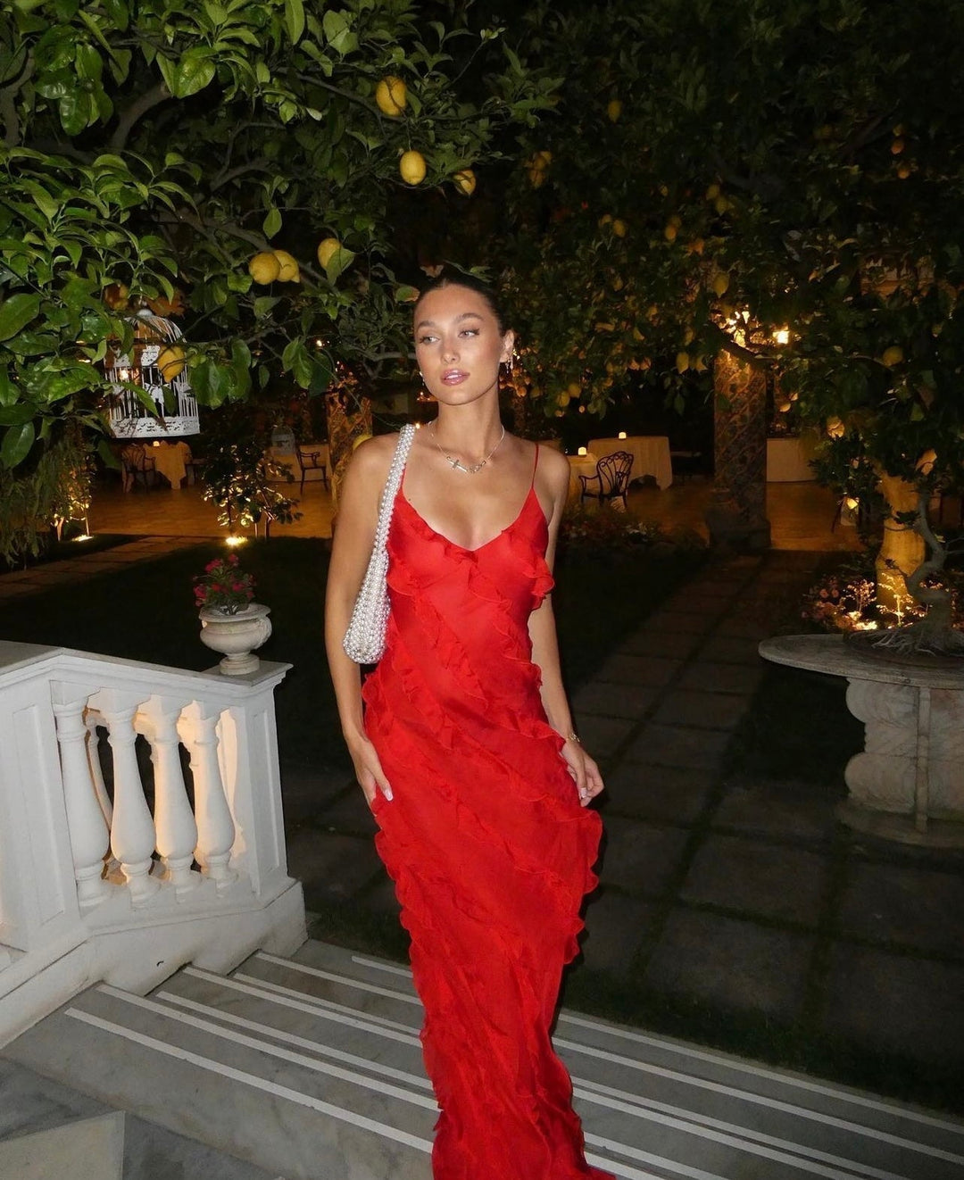 Elegant women's ruffled V-neck maxi dress, perfect for evening events & special occasions.