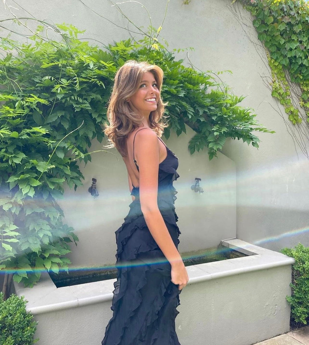 Women's elegant ruffled V-neck maxi dress for formal evenings and cocktail parties.