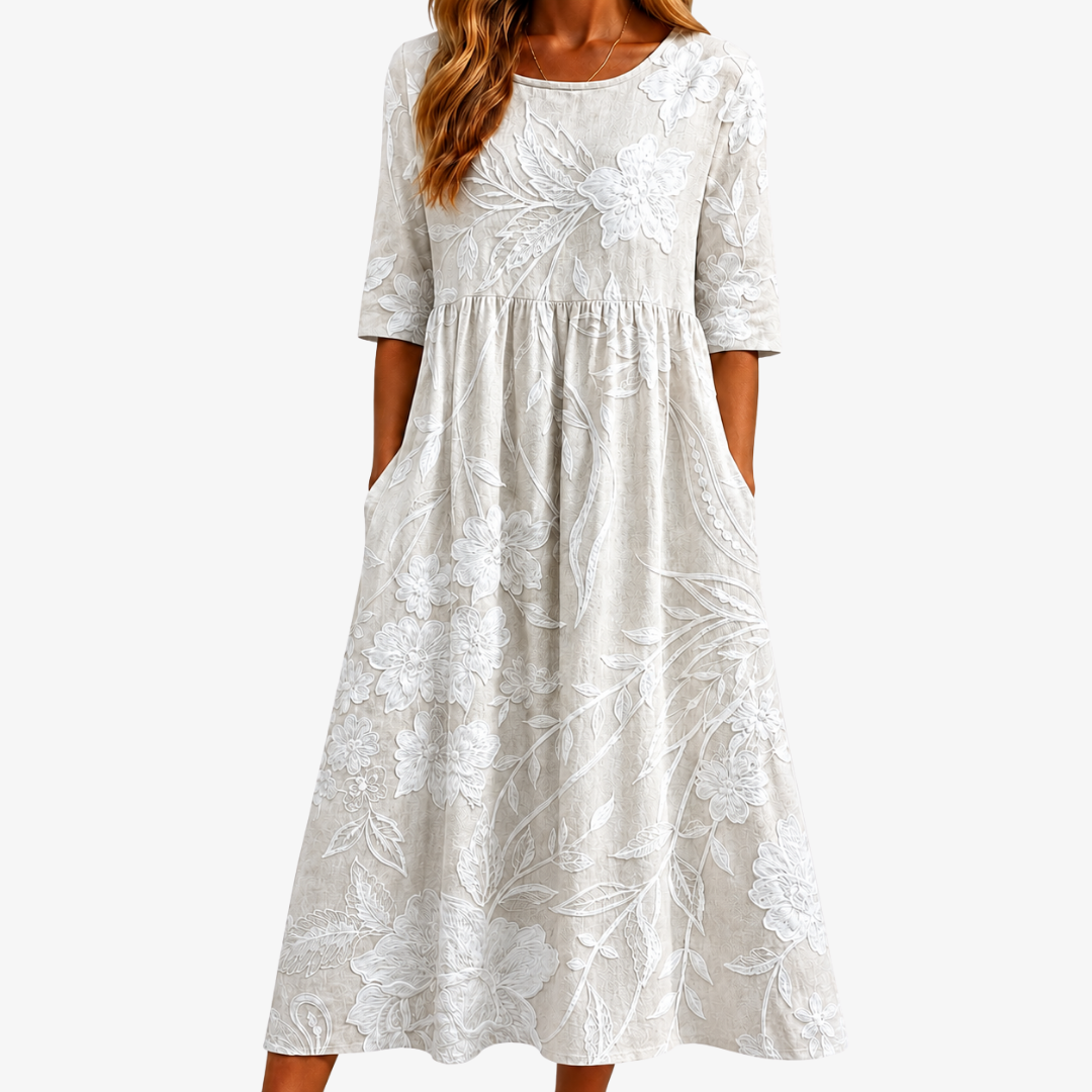 Elegant women's sage green floral midi dress with pockets, perfect for spring/summer casual or semi-formal wear.