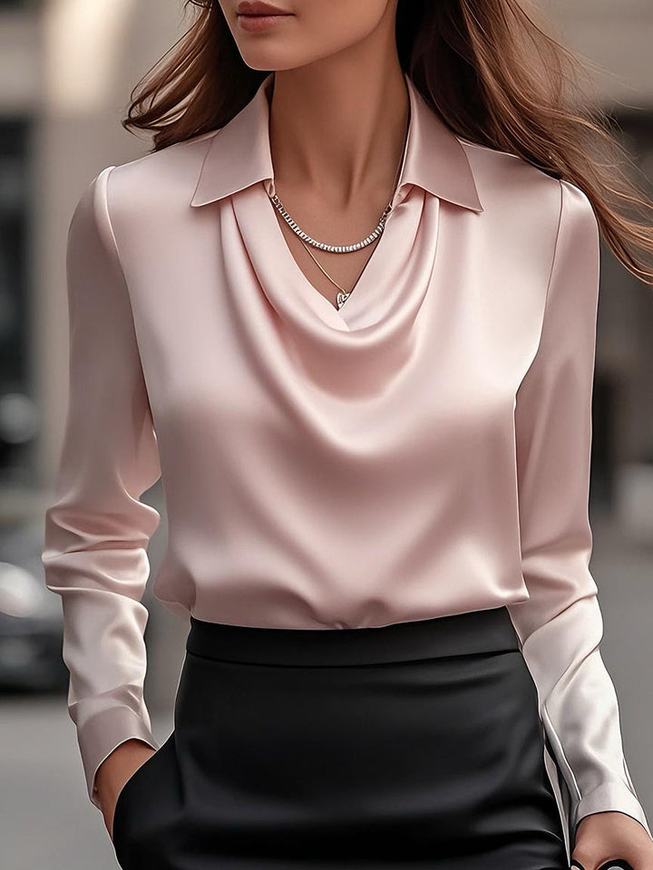 Women's draped neck satin blouse. Elegant long-sleeve top for refined style, workwear, or formal occasions.
