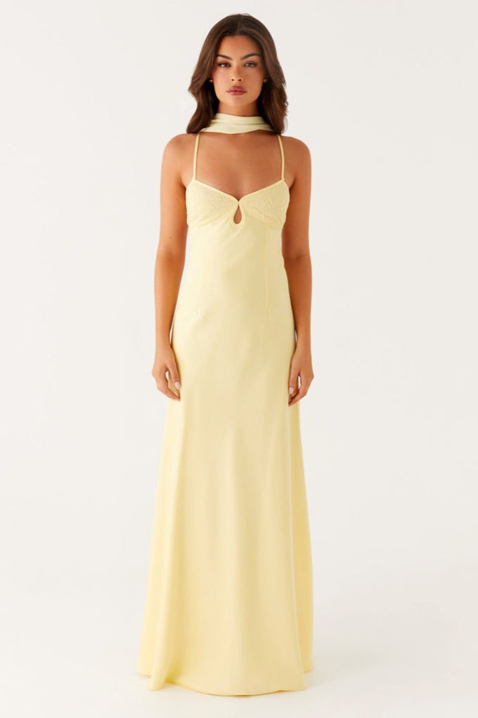 Formal women's maxi dress in smooth satin, featuring a V-neck and tie back.