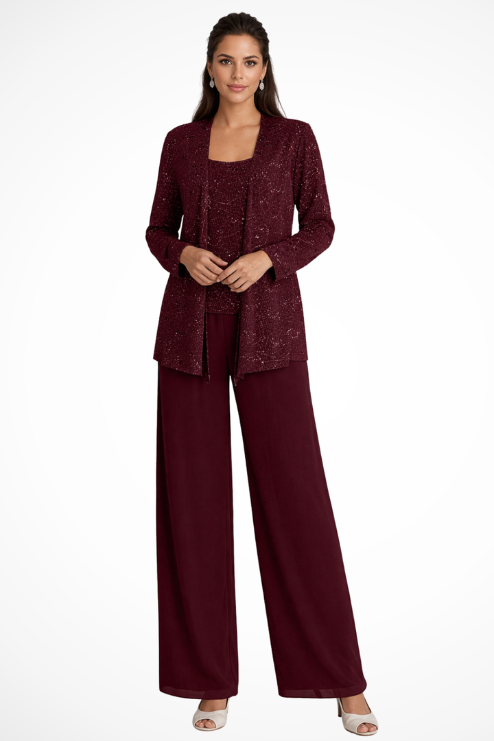 Sophisticated women's wide leg trouser suit with sequin lace jacket, evening wear.