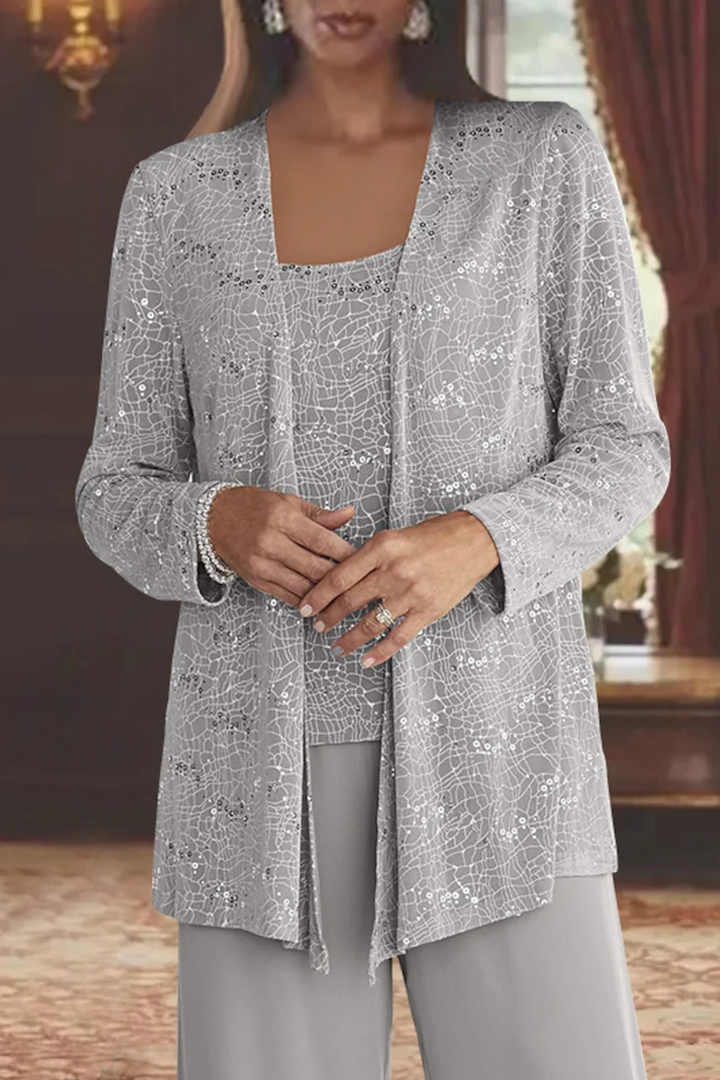 Close-up of sequin lace jacket detail, perfect for a wedding guest trouser suit.