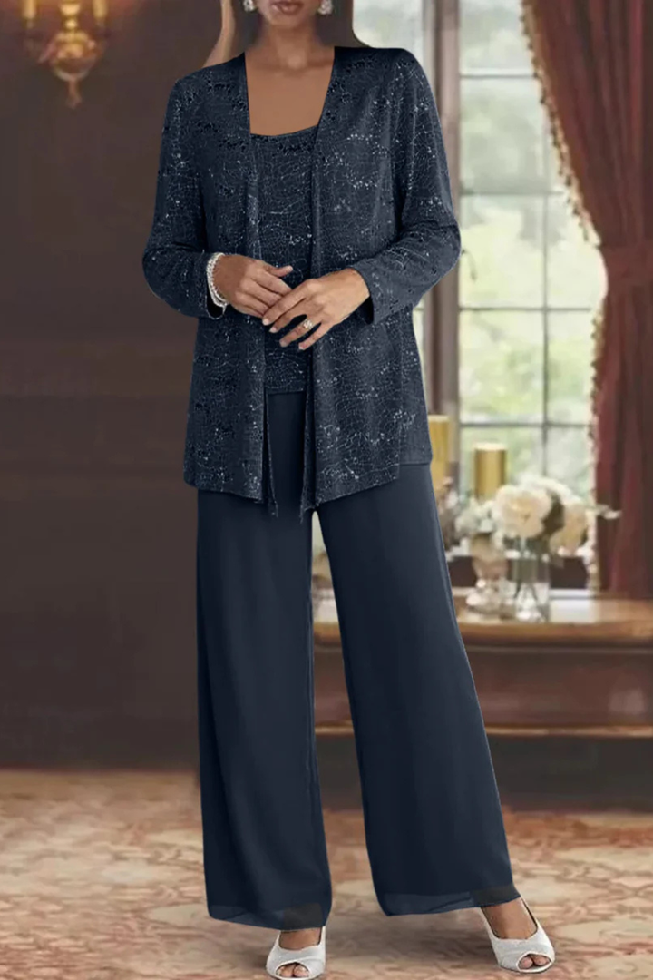 Sparkling sequin detail on an elegant women's lace jacket and wide leg trouser suit.
