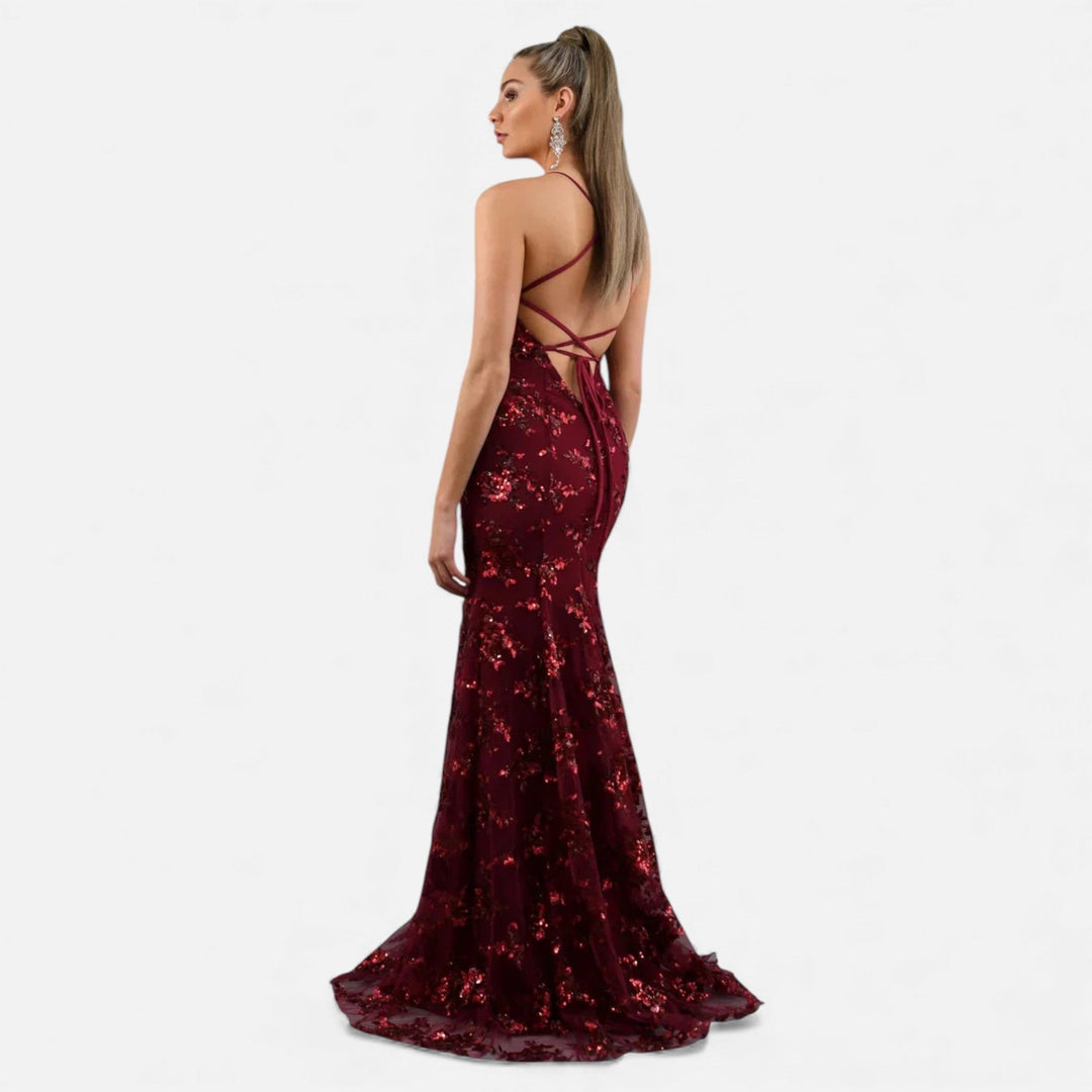 Shimmering women's sequin maxi dress, an elegant long gown perfect for glamorous evening wear.