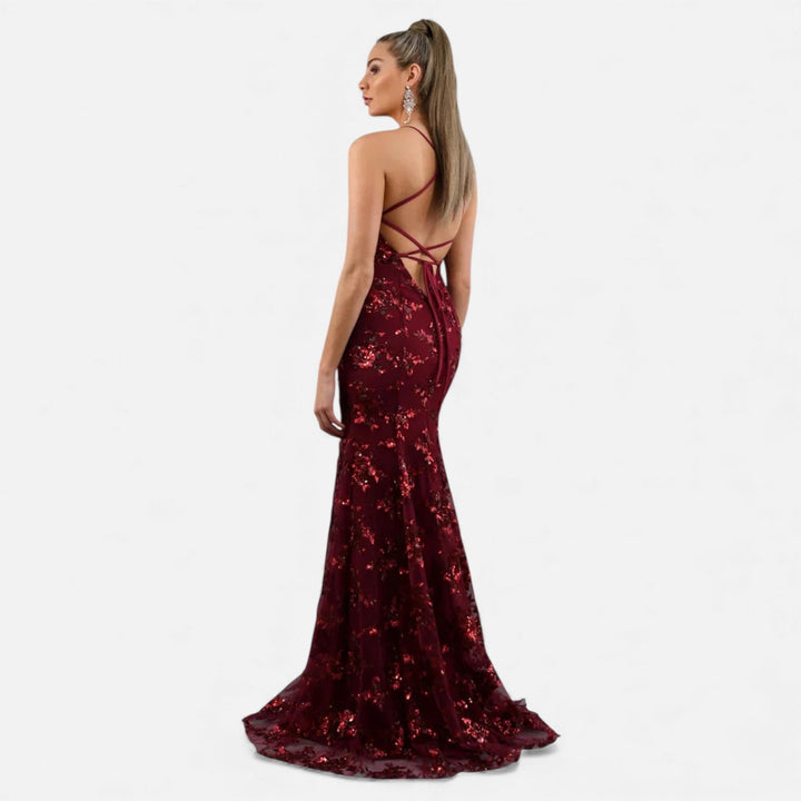 Shimmering women's sequin maxi dress, an elegant long gown perfect for glamorous evening wear.