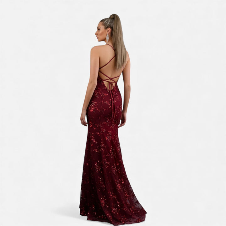 Luxurious women's sequin maxi dress, a glamorous long evening gown for a special occasion.