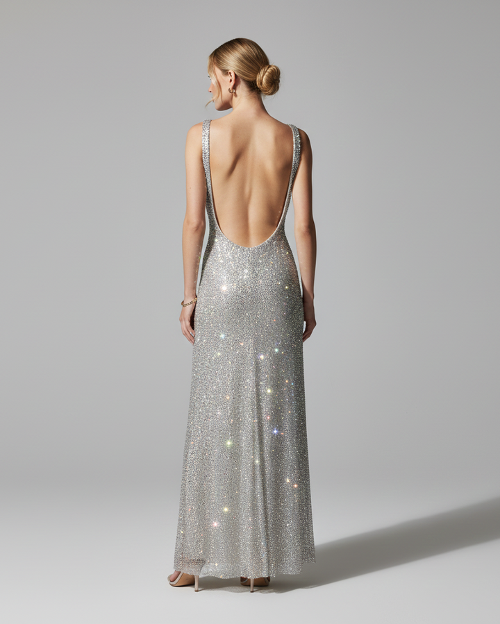 Sparkling backless sequin evening gown, a stunning maxi dress for formal parties.