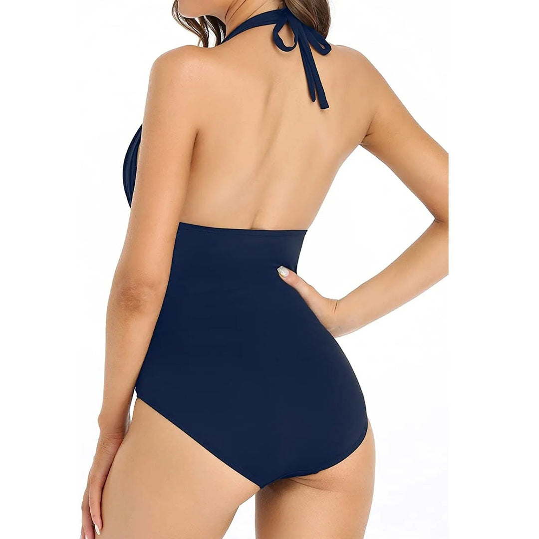 Women's swimwear: a black shaping one-piece swimsuit with push-up support and body-sculpting design.