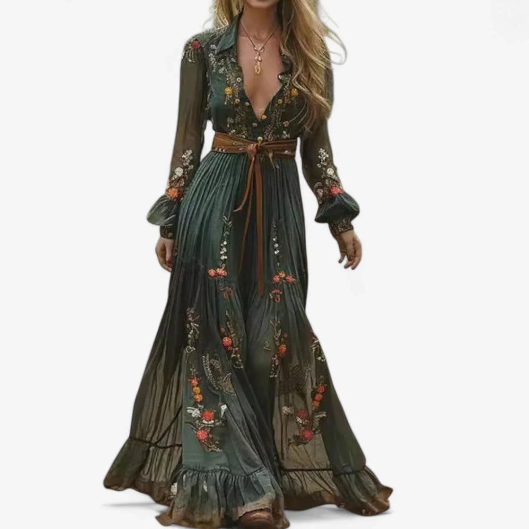 Elegant women's sheer maxi dress, embroidered with floral patterns, featuring a V-neck and stylish bishop sleeves.