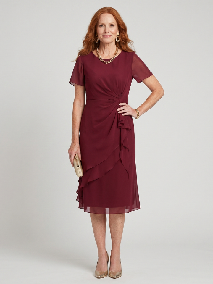 Elegant Women's Short Sleeve Midi Dress with Flowy Layered Hem. Perfect for versatile occasion wear.