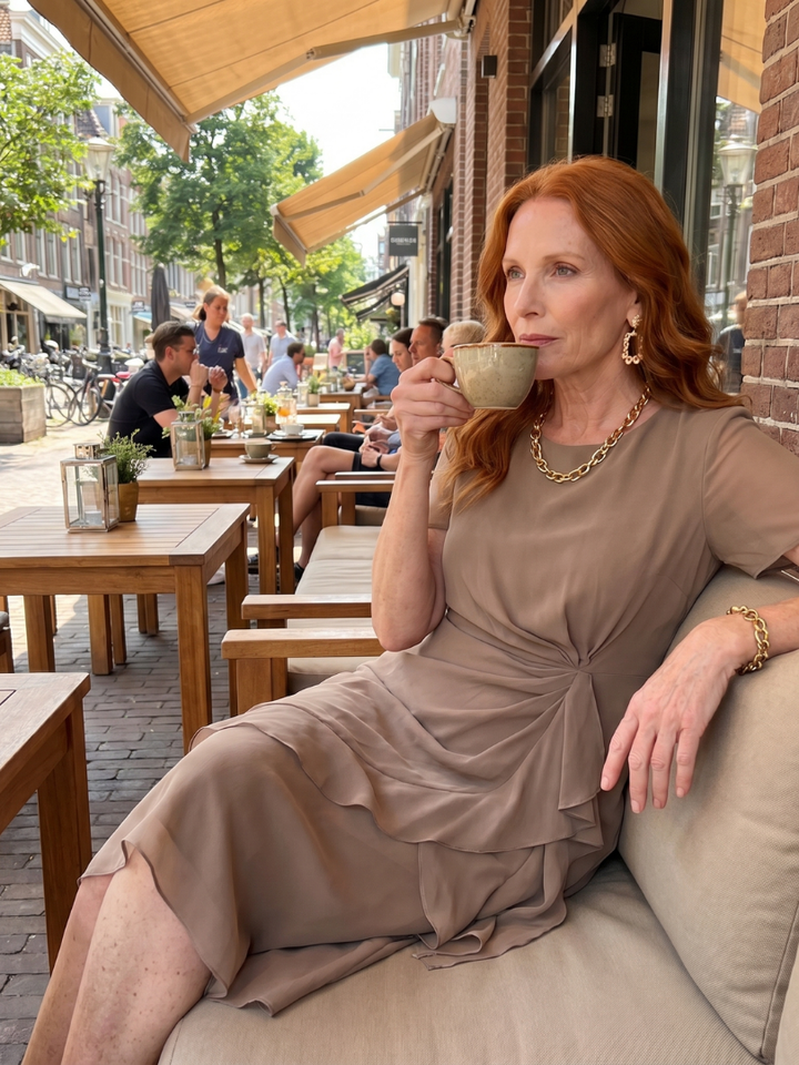 Cream elegant women's short sleeve midi dress with a sophisticated layered hem design and comfortable fit.