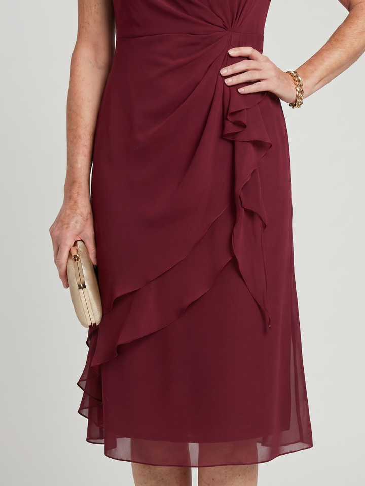 Comfortable women's elegant midi dress, short sleeves, soft fabric, and a flattering layered hem design.