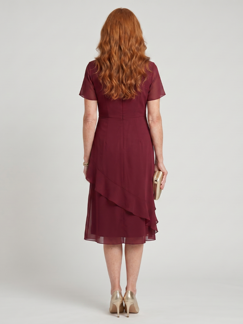 Versatile elegant short sleeve midi dress for women, flowy layered hem; ideal for various occasions.