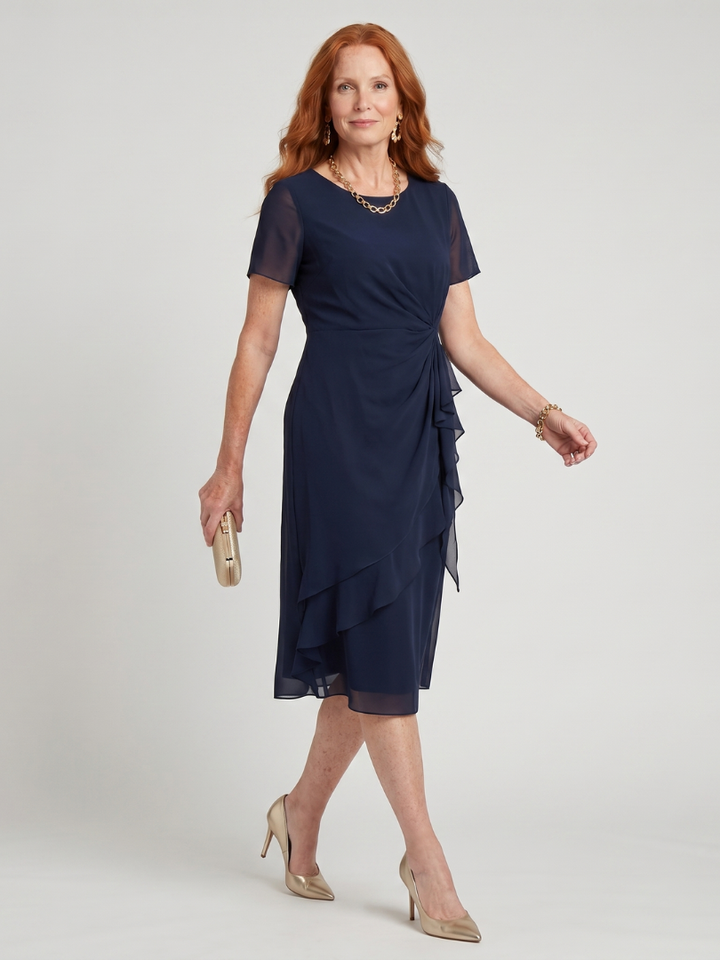 Elegant women's short sleeve midi dress, layered hem, comfortable fit, perfect for day or evening wear.