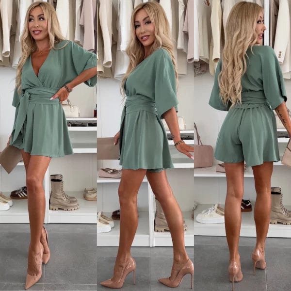 Women's elegant short sleeve wrap dress for summer. Comfortable V-neck midi dress with a flattering flared silhouette.