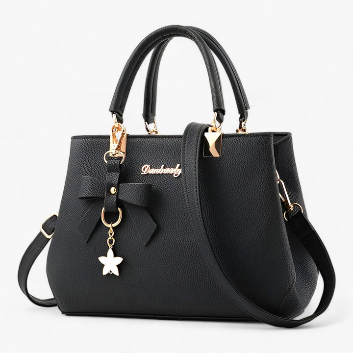 Chic women's business handbag, a stylish and practical accessory for work, complementing any elegant outfit.