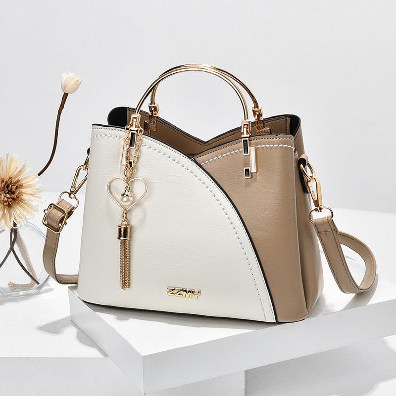 Elegant women's shoulder bag with adjustable strap, perfect for everyday fashion.