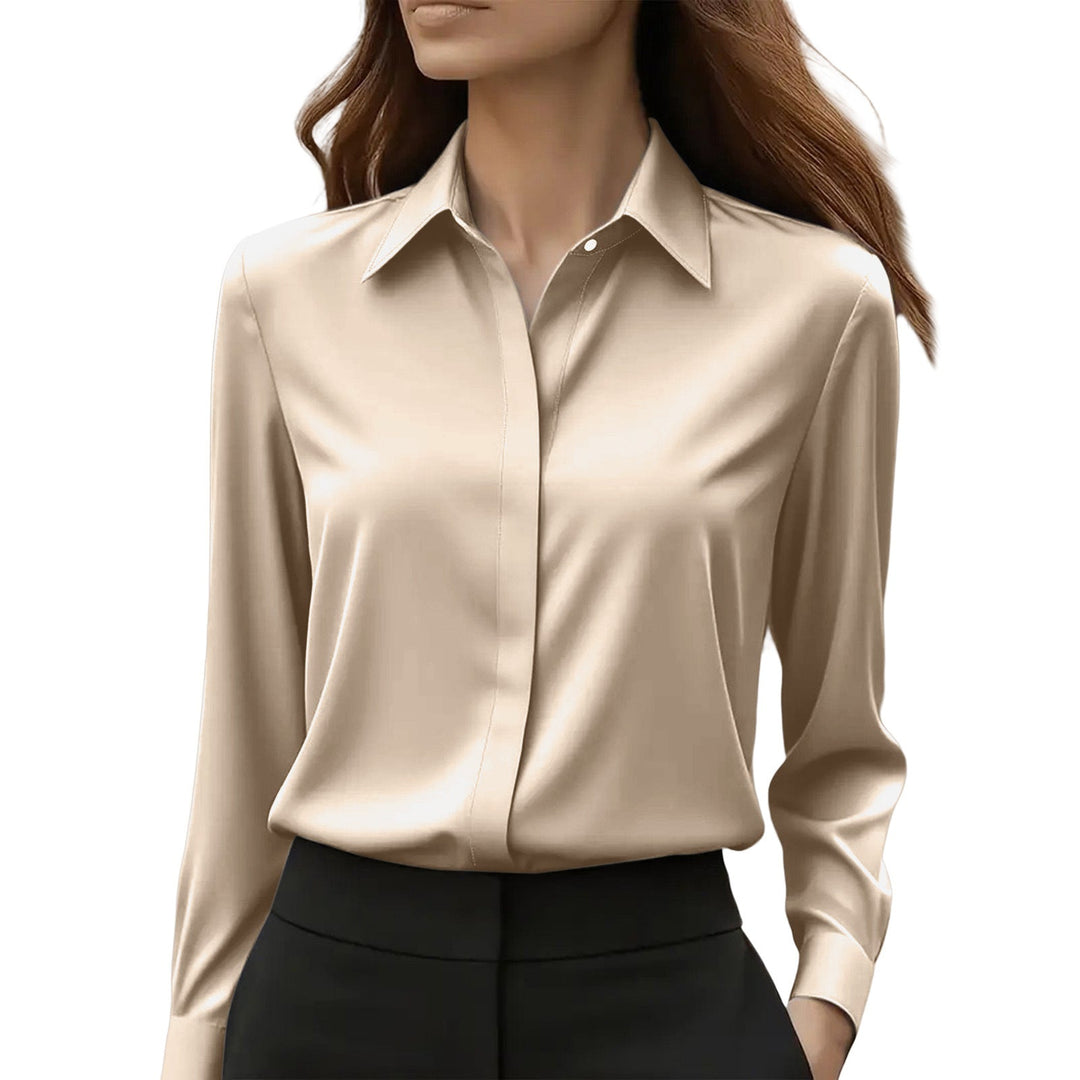 Discover elegant style with this women's button-up silk blouse, a wardrobe essential.