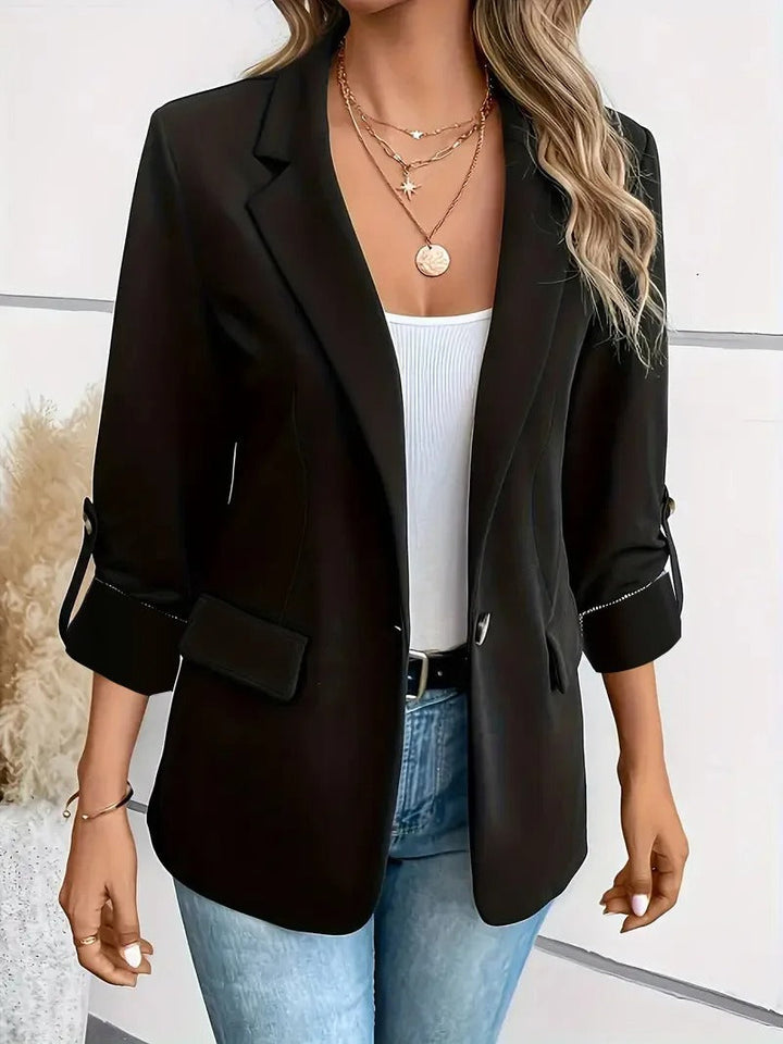 Stylish women's tailored blazer jacket, single-breasted design for a chic professional and elegant look.