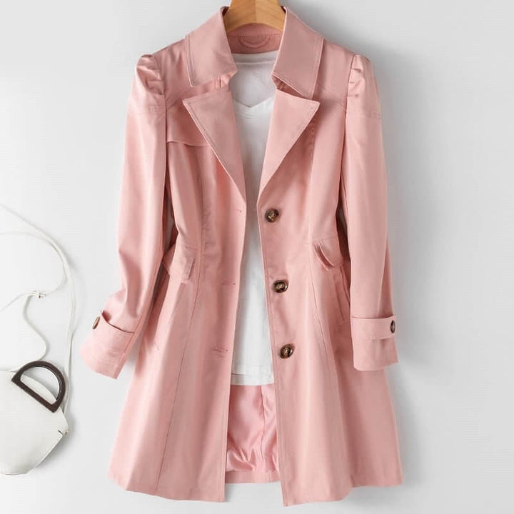 Elegant women's single-breasted trench coat for a timeless, sophisticated look. Classic design.