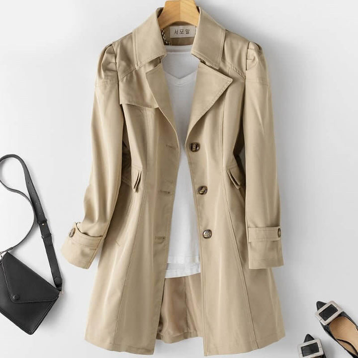 Women's single-breasted long trench coat. Elegant and sophisticated style, perfect for spring or fall.