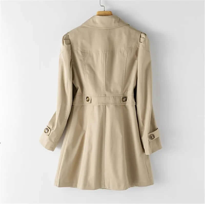 Sophisticated women's single-breasted trench coat, a classic belted long jacket for timeless elegance.