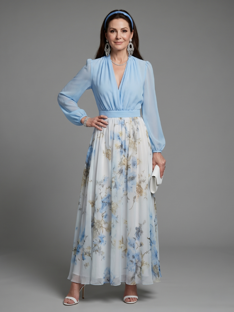 Elegant women's sky blue floral V-neck maxi dress with a sheer bodice and flowing skirt, ideal for occasions.