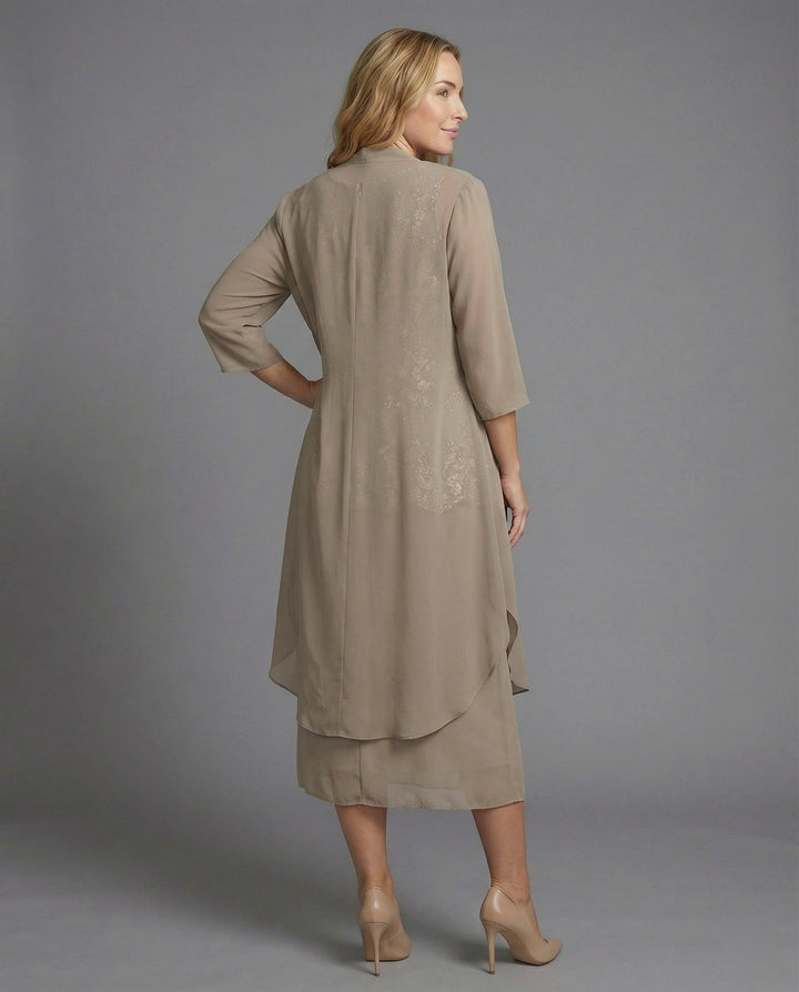 Chic lilac two-piece top & pants set for women, an elegant and comfortable casual outfit.