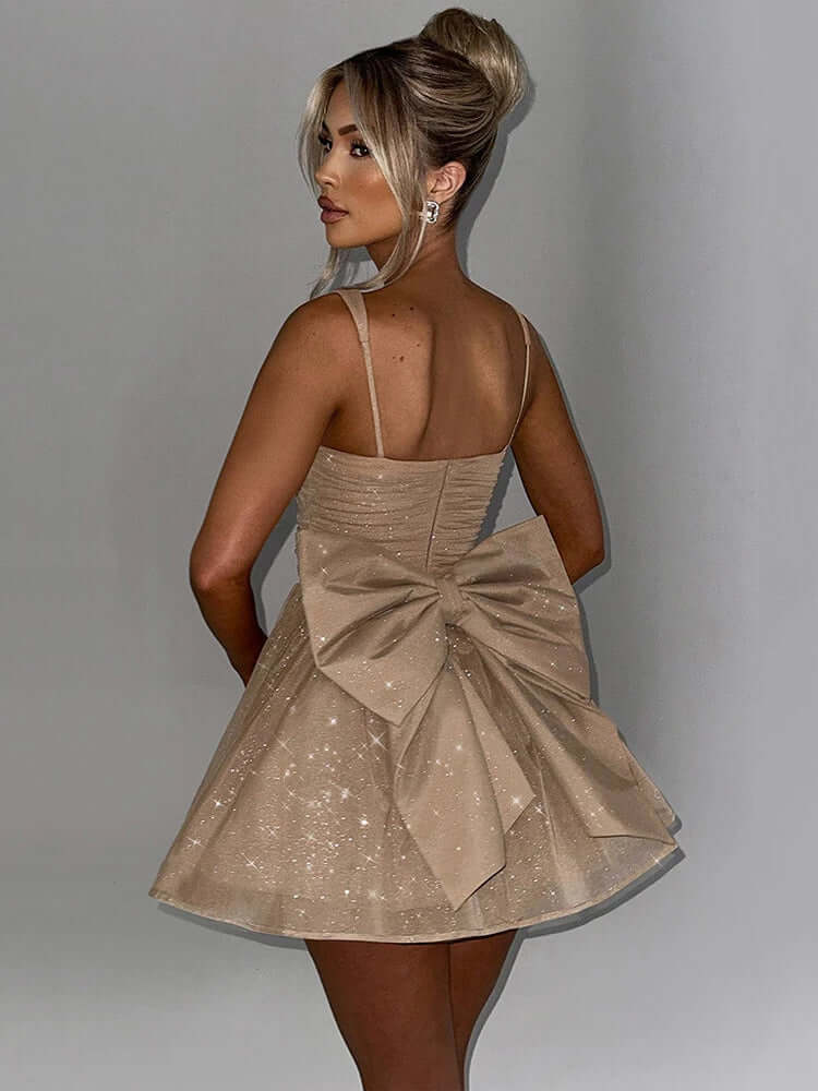 Chic women's sleeveless A-line dress featuring a delicate bow, ideal for cocktail parties and evening events.