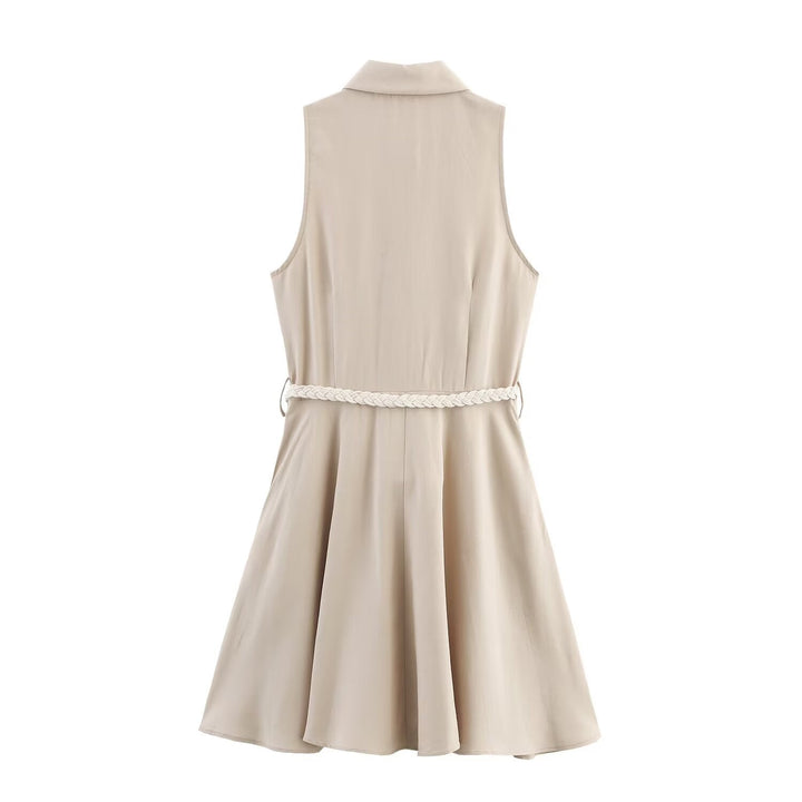 Stylish women's beige sleeveless mini dress with elegant button front. A comfortable shirt dress for summer & office.