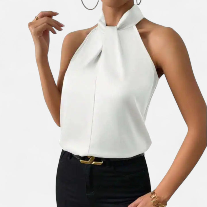 Versatile women's sleeveless twisted neck top, an elegant blouse for casual outings or sophisticated occasions.