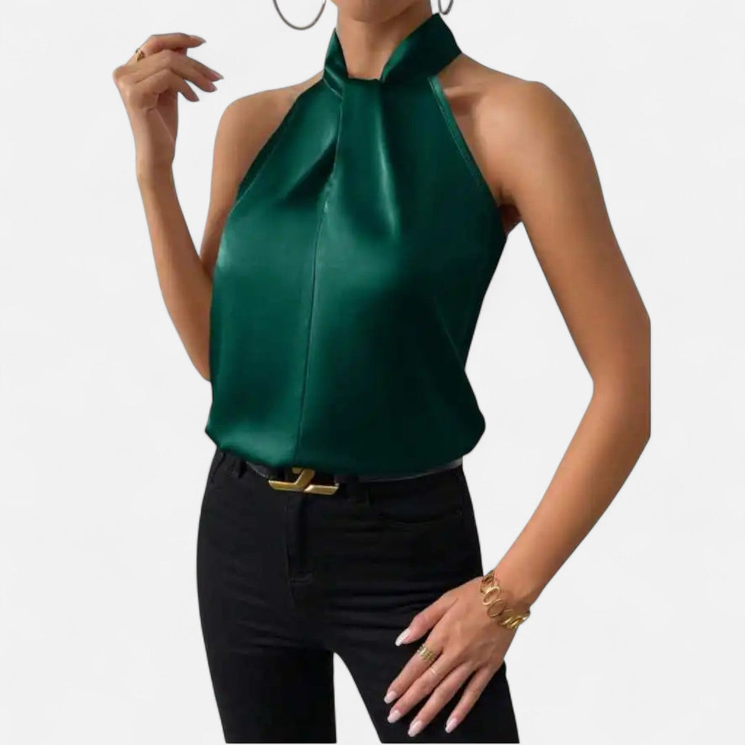 Polished women's sleeveless twisted neck blouse, offering a sleek, elegant look for any sophisticated ensemble.