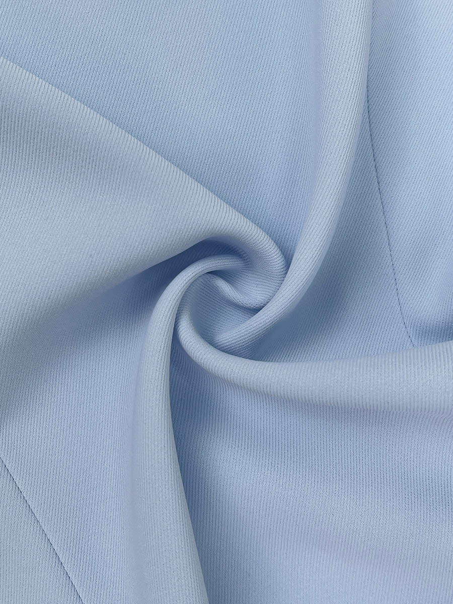 Women's sleeveless maxi dress, featuring a sophisticated drop-waist and elegant pleats, ideal for wedding guests.
