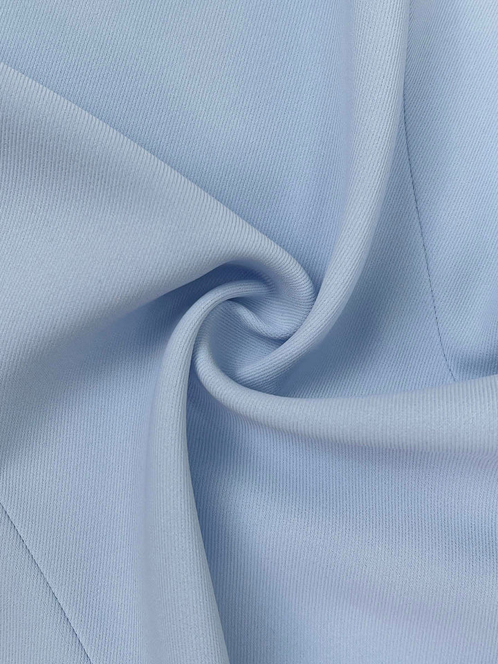 Women's sleeveless maxi dress, featuring a sophisticated drop-waist and elegant pleats, ideal for wedding guests.