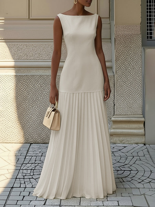 Women's elegant sleeveless boat neck long dress, featuring a flattering drop-waist and beautiful pleated skirt detail.