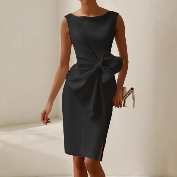Tailored boat neck midi dress for women, sleeveless and adorned with a fashionable side bow, an occasion dress.