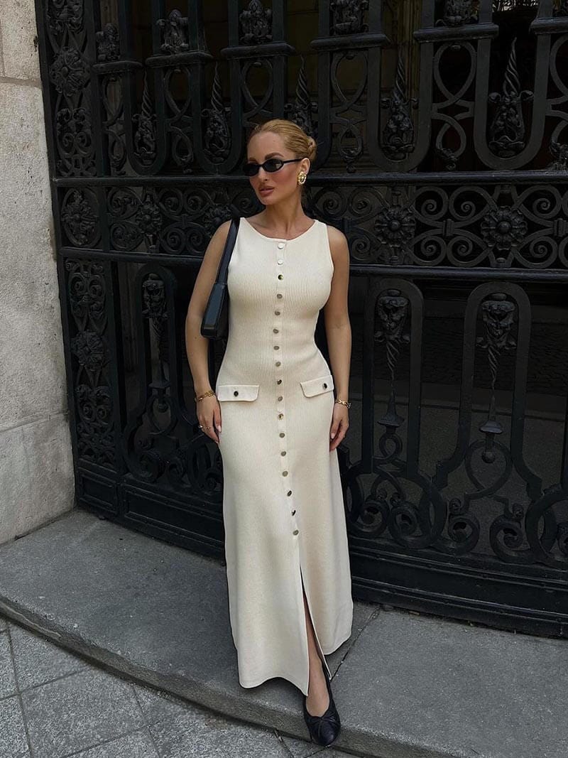 Elegant women's sleeveless button-front maxi dress, perfect for stylish summer events or vacation. Day to night wear.