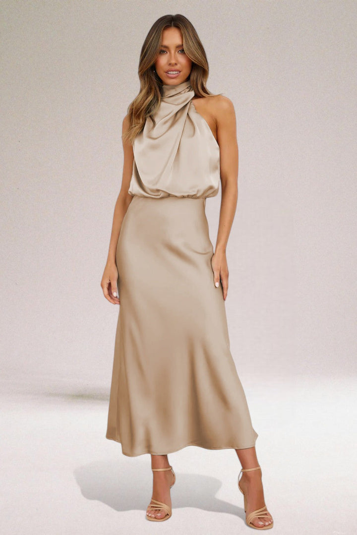 Elegant women's sleeveless cowl neck midi dress, draped fabric, perfect for evening, cocktail, or formal occasions.